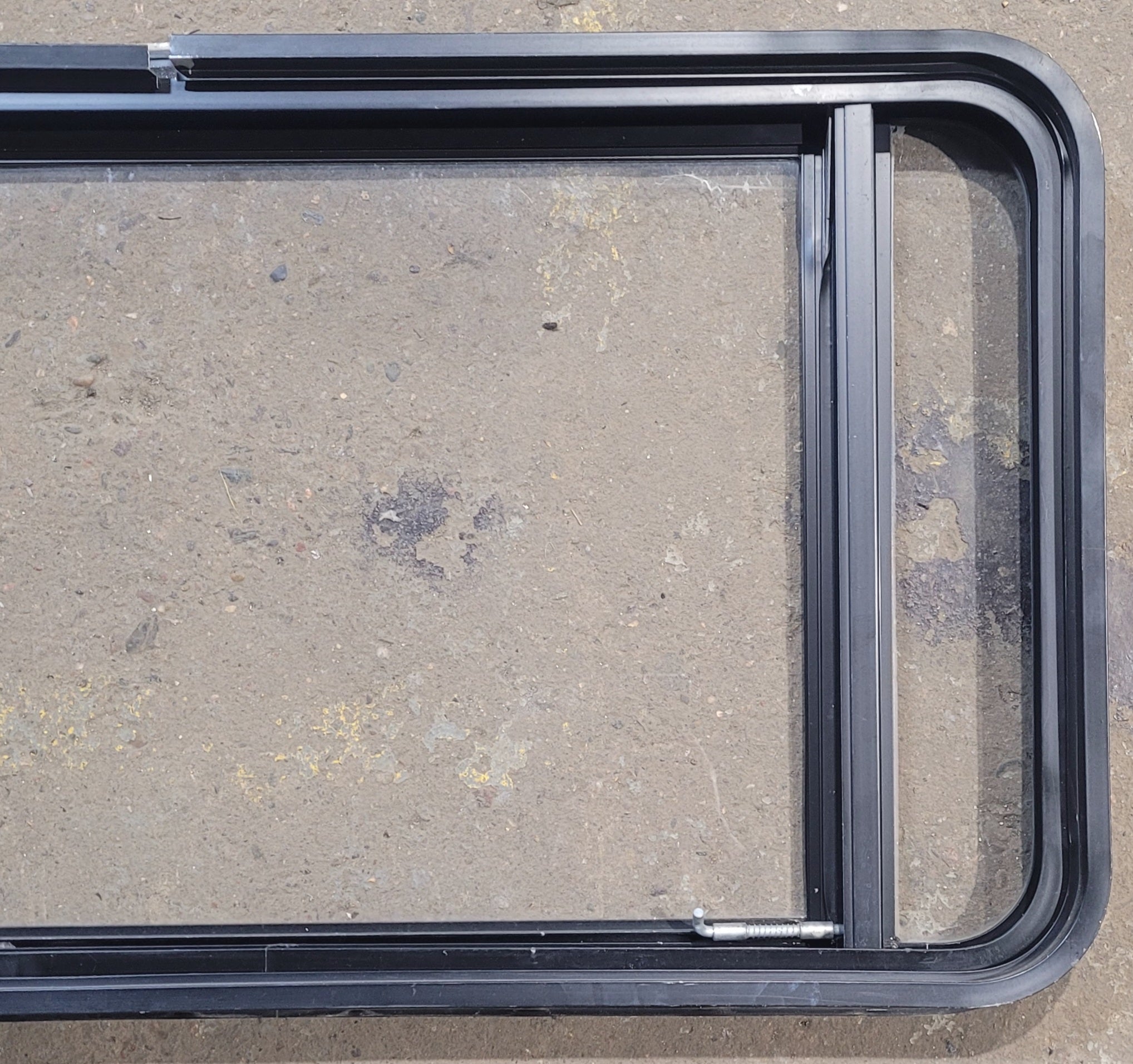 Used Black Radius Emergency Opening Window : 37 3/4" W x 21 3/4" H x 1 3/4" D - Young Farts RV Parts