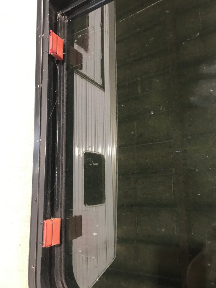 Used Black Radius Emergency Opening Window : 41 1/2" W x 21 1/2" H x 1 7/8" - Young Farts RV Parts