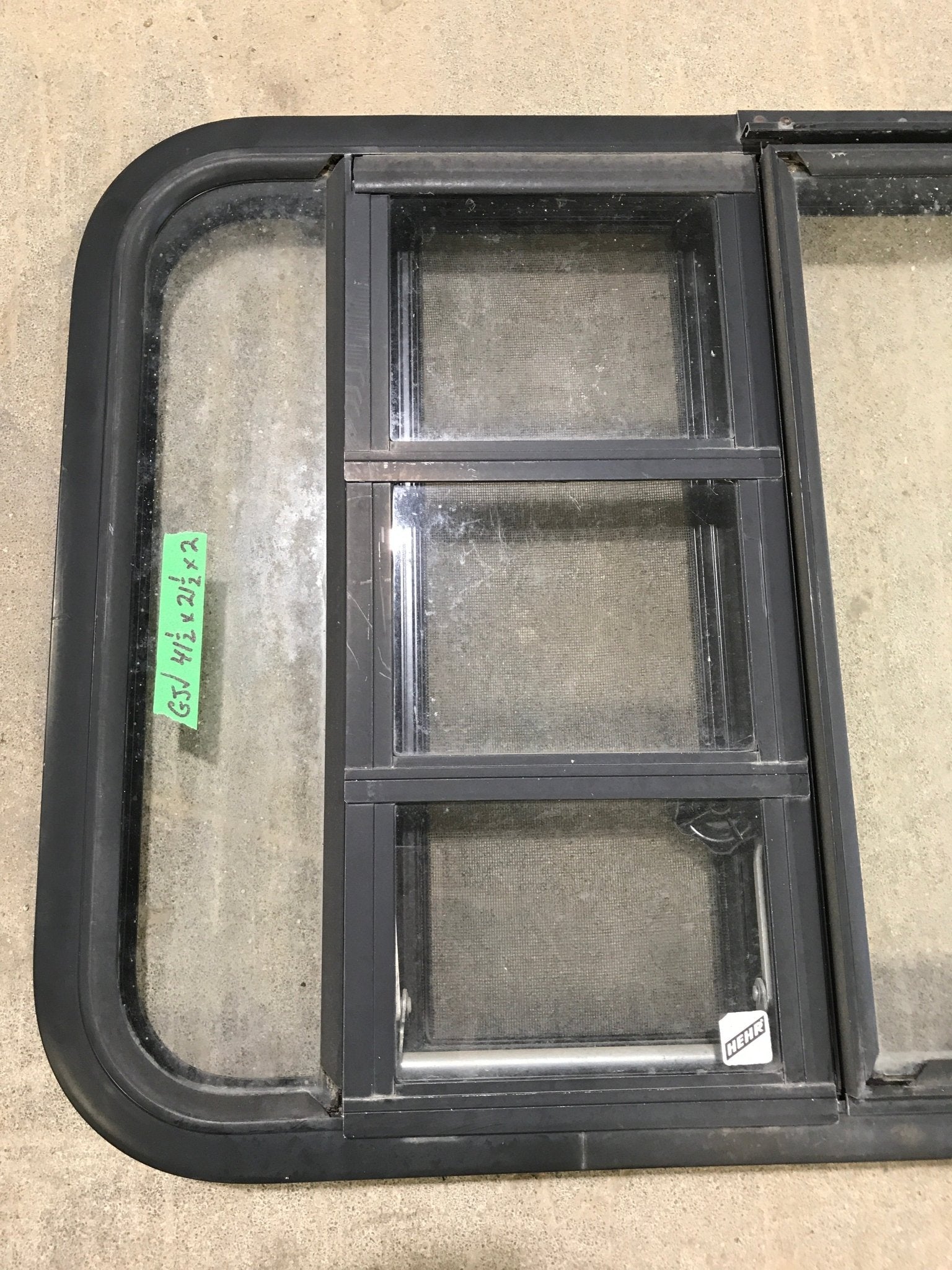 Used Black Radius Emergency Opening Window : 41 1/2" W x 21 1/2" H x 2" D - Young Farts RV Parts