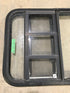 Used Black Radius Emergency Opening Window : 41 1/2" W x 21 1/2" H x 2" D - Young Farts RV Parts