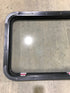 Used Black Radius Emergency Opening Window : 41 1/2" W x 21 1/2" H x 2" D - Young Farts RV Parts