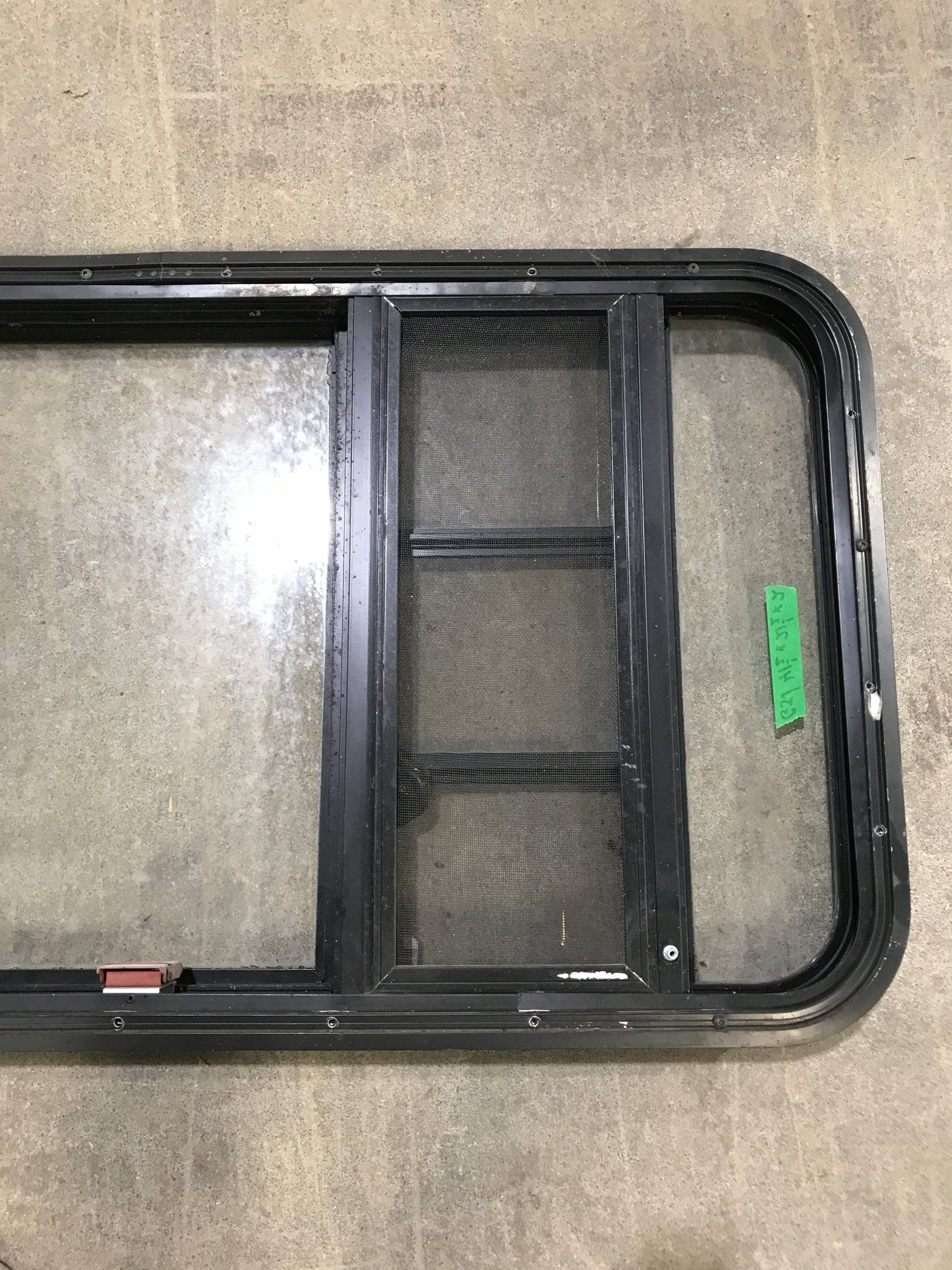 Used Black Radius Emergency Opening Window : 41 1/2" W x 21 1/2" H x 2" D - Young Farts RV Parts