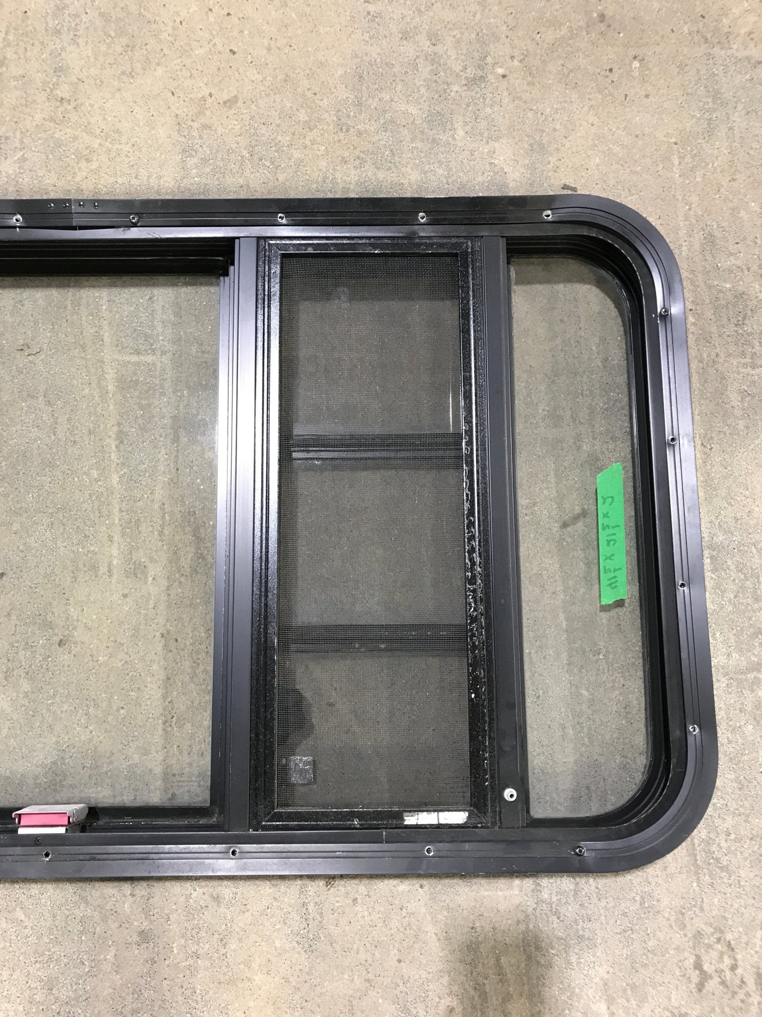 Used Black Radius Emergency Opening Window : 41 1/2" W x 21 1/2" H x 2" D - Young Farts RV Parts