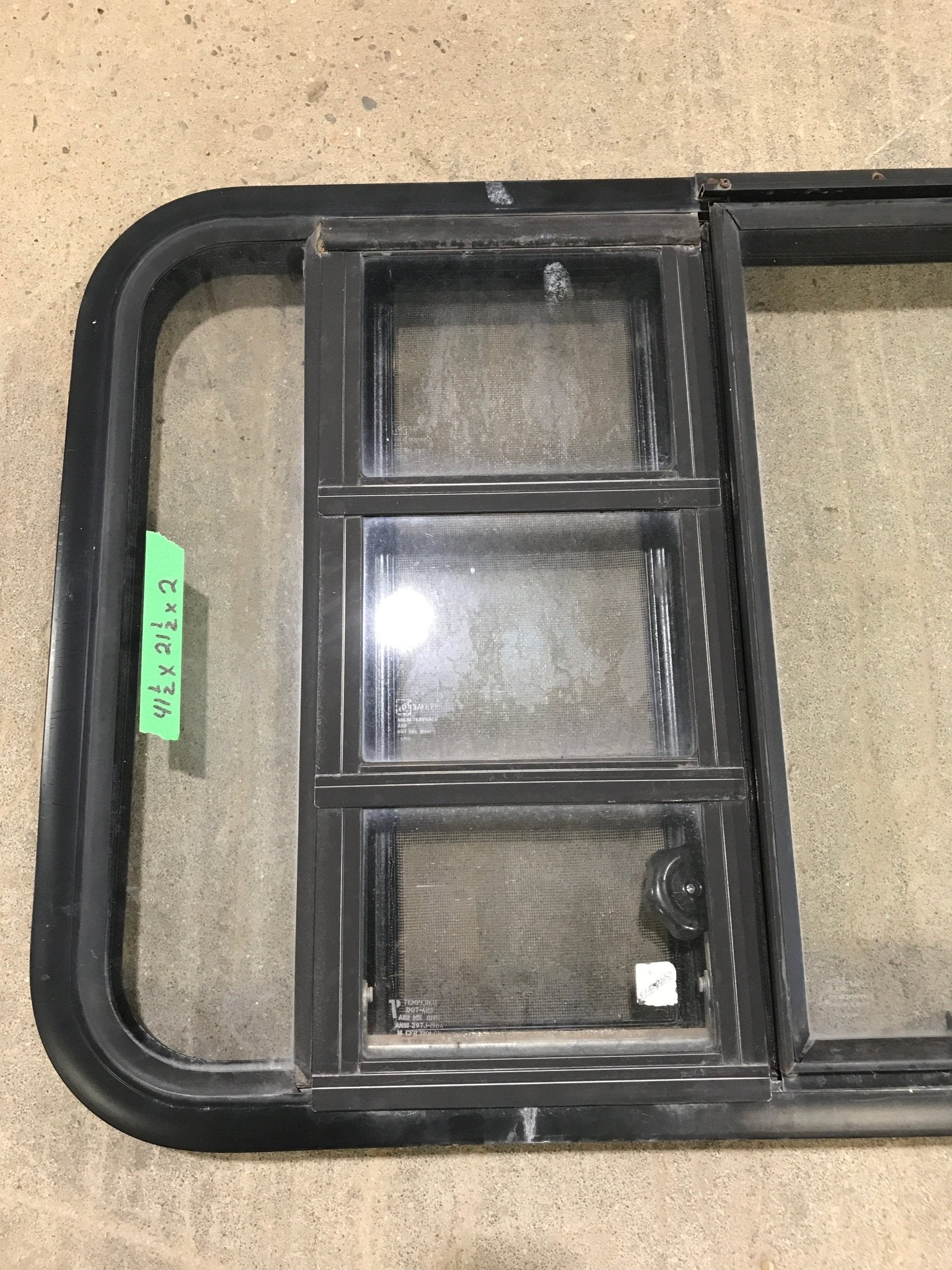 Used Black Radius Emergency Opening Window : 41 1/2" W x 21 1/2" H x 2" D - Young Farts RV Parts