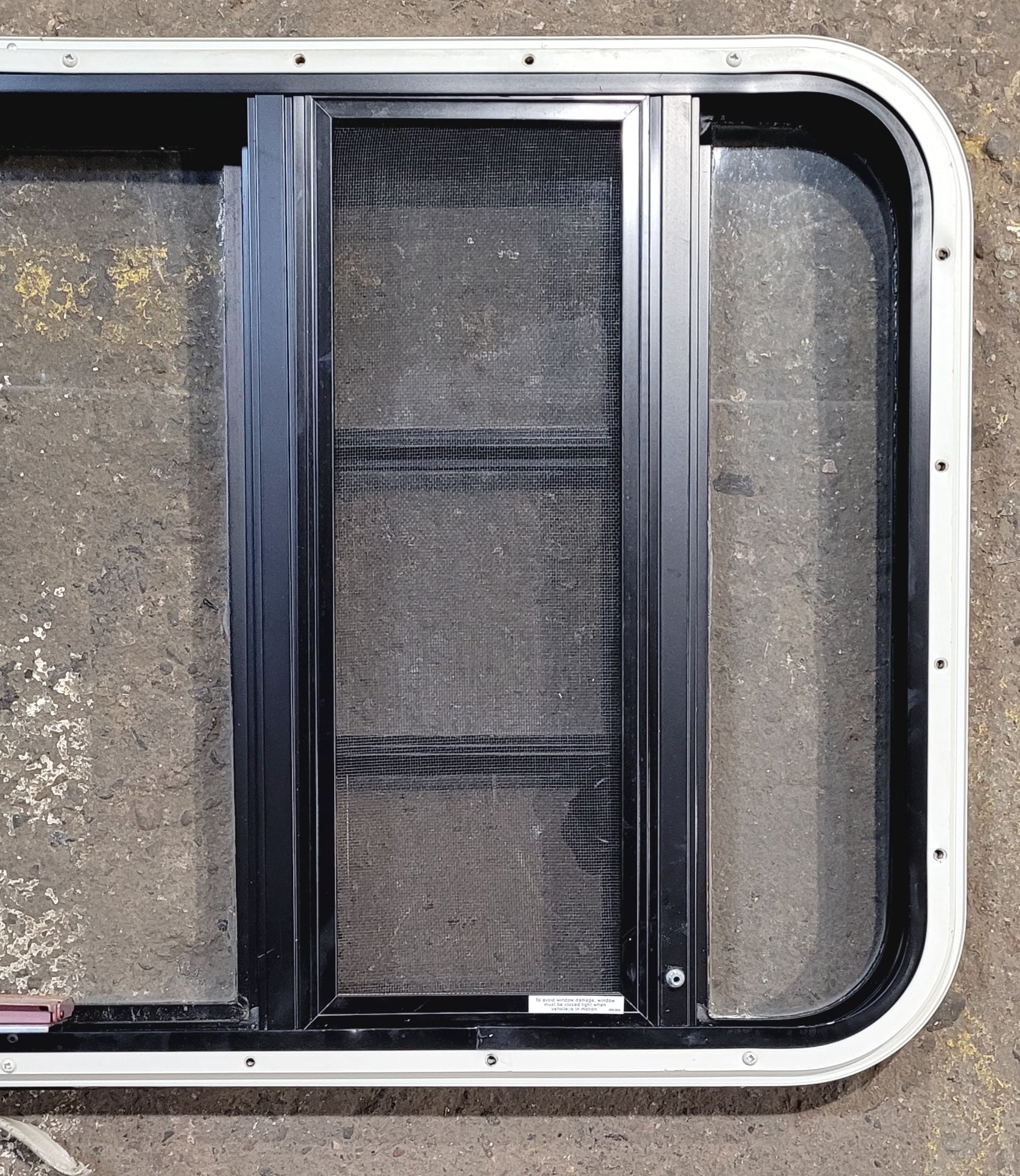 Used Black Radius Emergency Opening Window : 41 1/2" W x 21 3/4" H x 1 1/4" D - Young Farts RV Parts