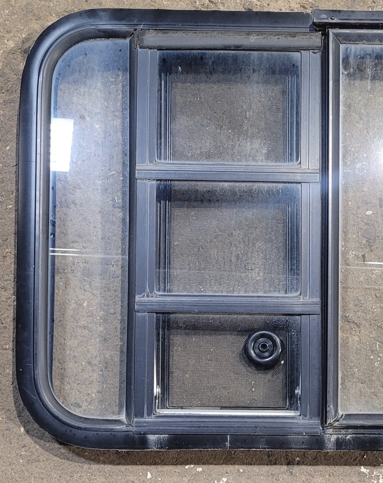 Used Black Radius Emergency Opening Window : 41 1/2" W x 21 3/4" H x 1 1/4" D - Young Farts RV Parts