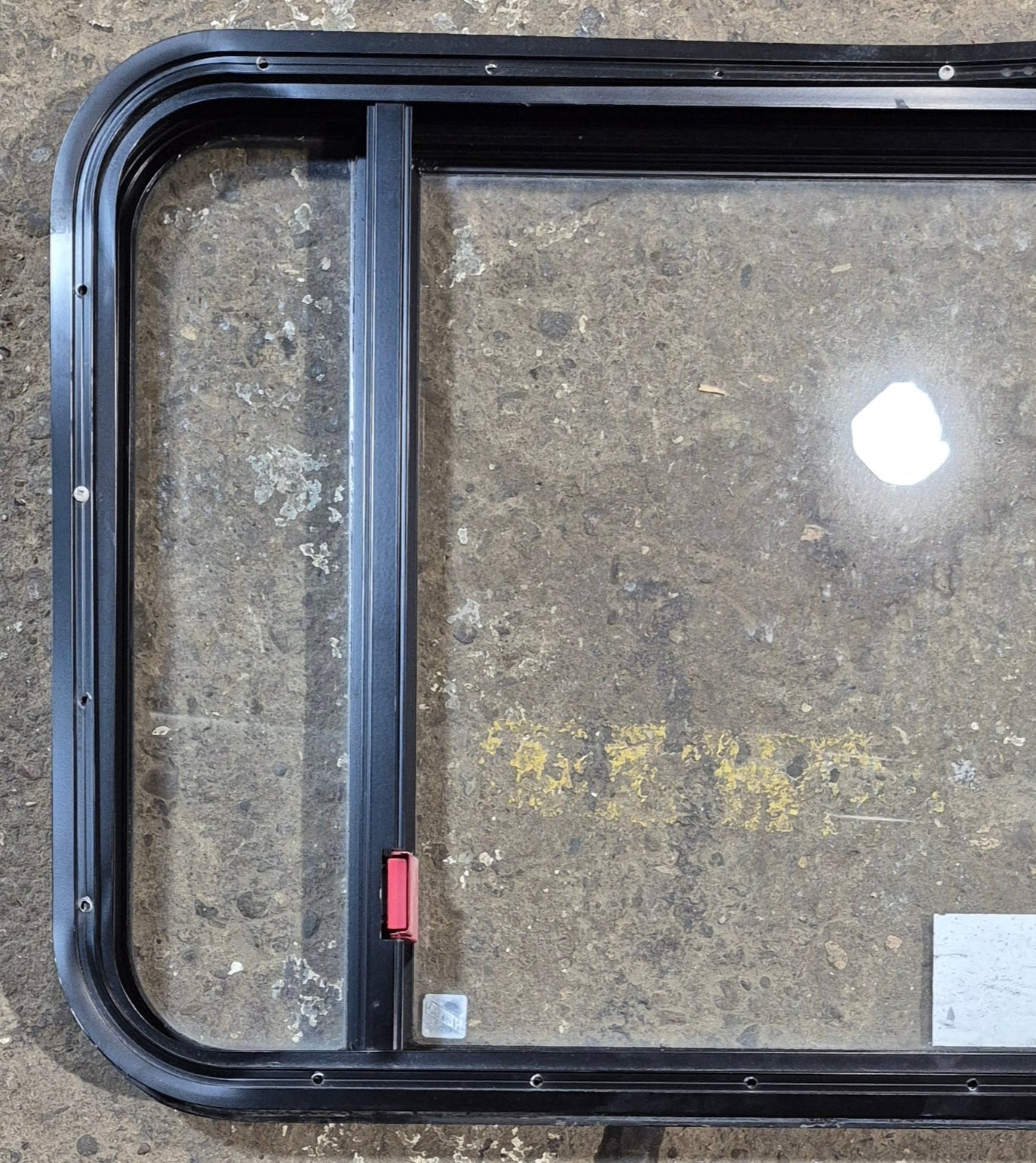 Used Black Radius Emergency Opening Window : 41 1/2" W x 21 3/4" H x 1 7/8" - Young Farts RV Parts