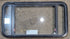 Used Black Radius Emergency Opening Window : 41 1/2" W x 21 3/4" H x 1 7/8" - Young Farts RV Parts