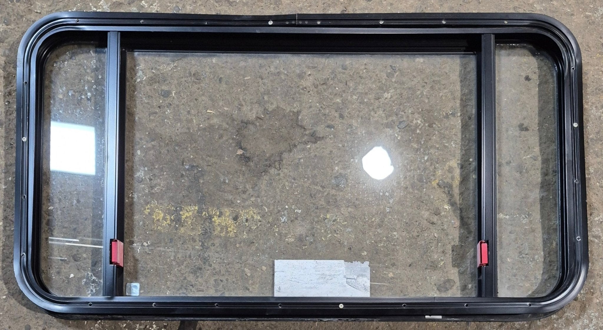 Used Black Radius Emergency Opening Window : 41 1/2" W x 21 3/4" H x 1 7/8" - Young Farts RV Parts