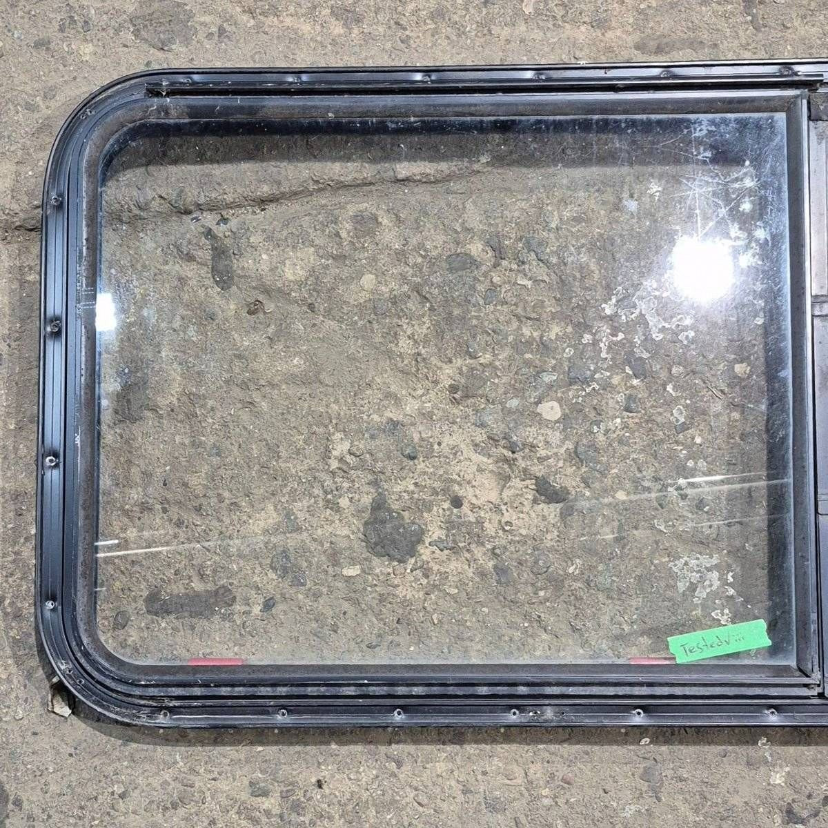 Used Black Radius Emergency Opening Window - 41.625 X 21.875 X 1.375 - Young Farts RV Parts