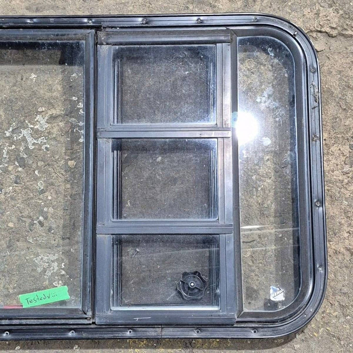 Used Black Radius Emergency Opening Window - 41.625 X 21.875 X 1.375 - Young Farts RV Parts