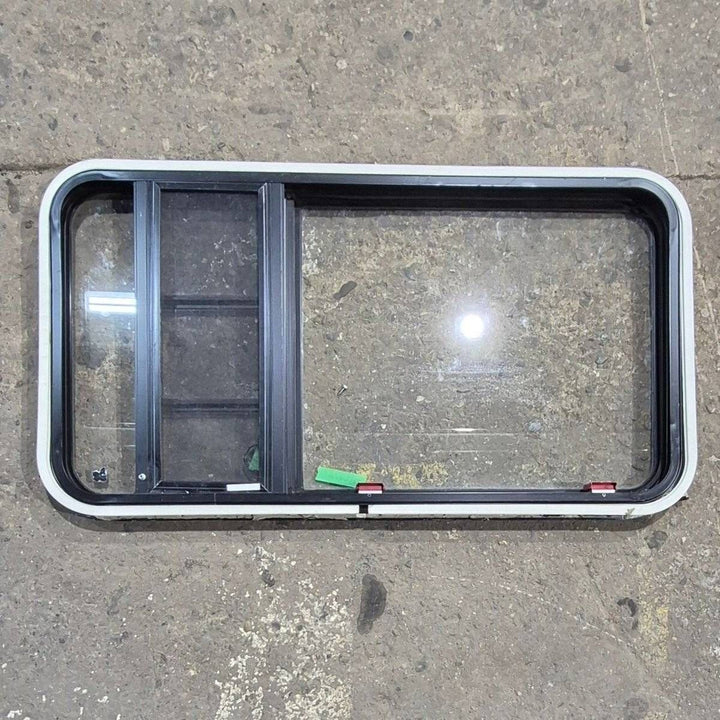 Used Black Radius Emergency Opening Window - 41.625 X 21.875 X 1.375 - Young Farts RV Parts