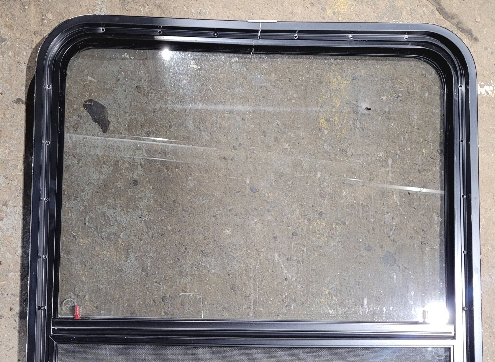 Used Black Radius Emergency Opening Window : 42 1/4" W x 29 1/2" H x 1 3/4" - Young Farts RV Parts