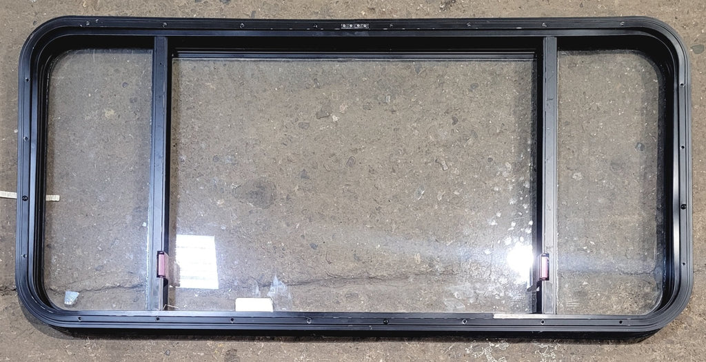 Used Black Radius Emergency Opening Window : 47 1/2" W x 21 1/2" H x 1 3/4" - Young Farts RV Parts