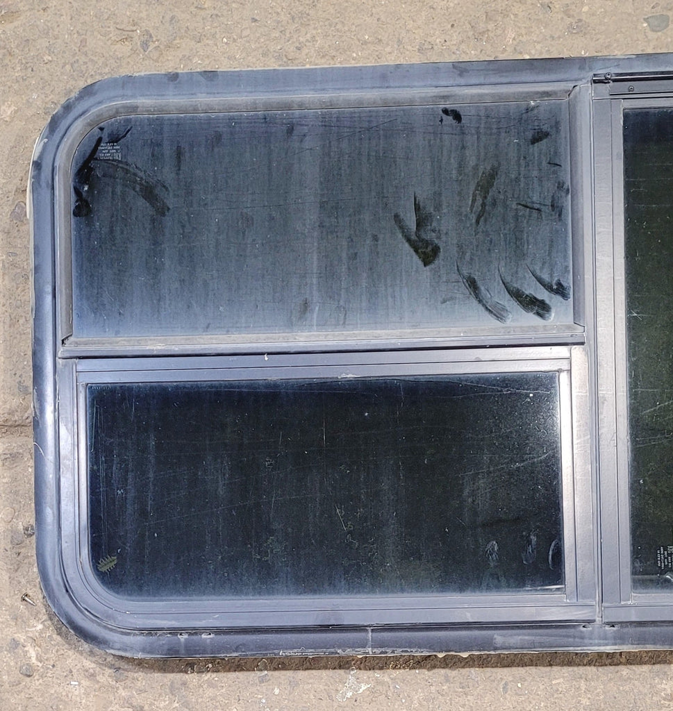 Used Black Radius Emergency Opening Window : 47 1/2" W x 21 1/2" H x 1 3/4" - Young Farts RV Parts