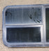 Used Black Radius Emergency Opening Window : 47 1/2" W x 21 1/2" H x 1 3/4" - Young Farts RV Parts