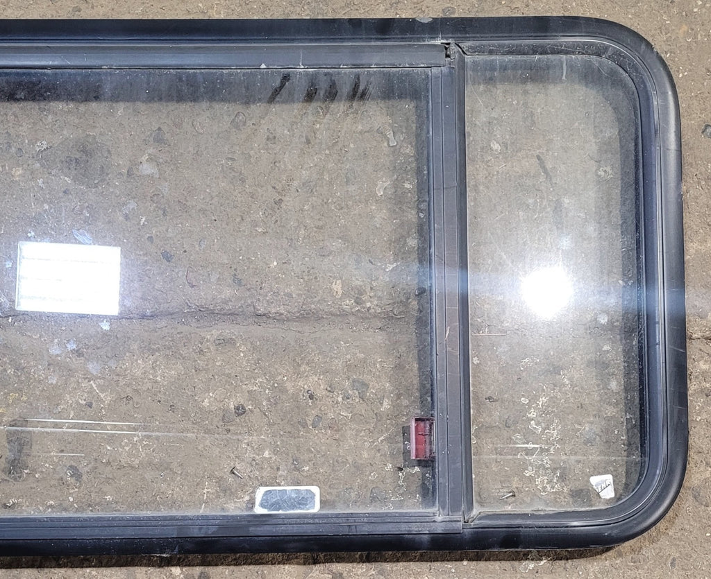 Used Black Radius Emergency Opening Window : 47 1/2" W x 21 1/2" H x 1 3/4" - Young Farts RV Parts