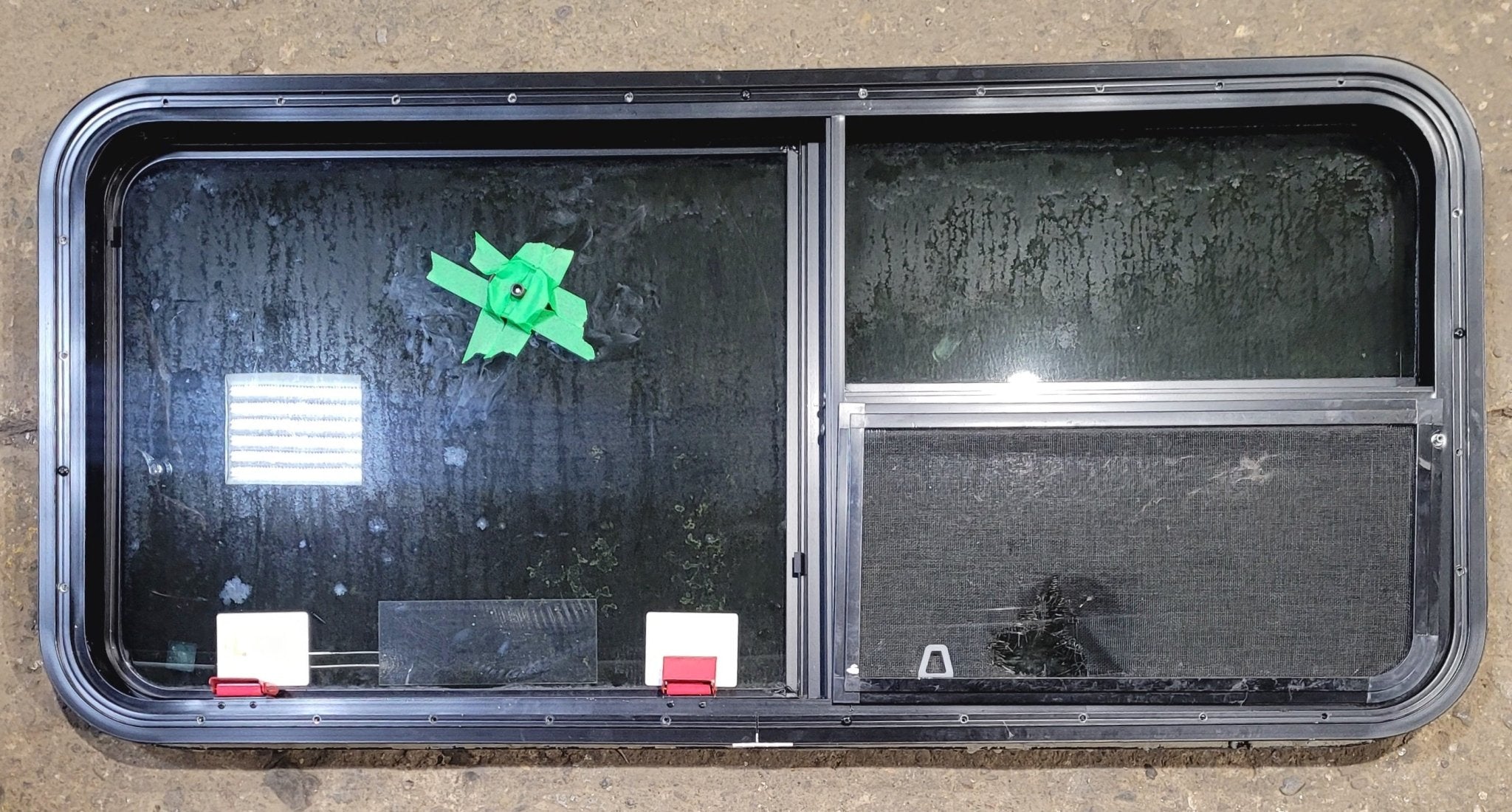 Used Black Radius Emergency Opening Window : 47 1/2" W x 21 1/2" H x 1 3/4" - Young Farts RV Parts