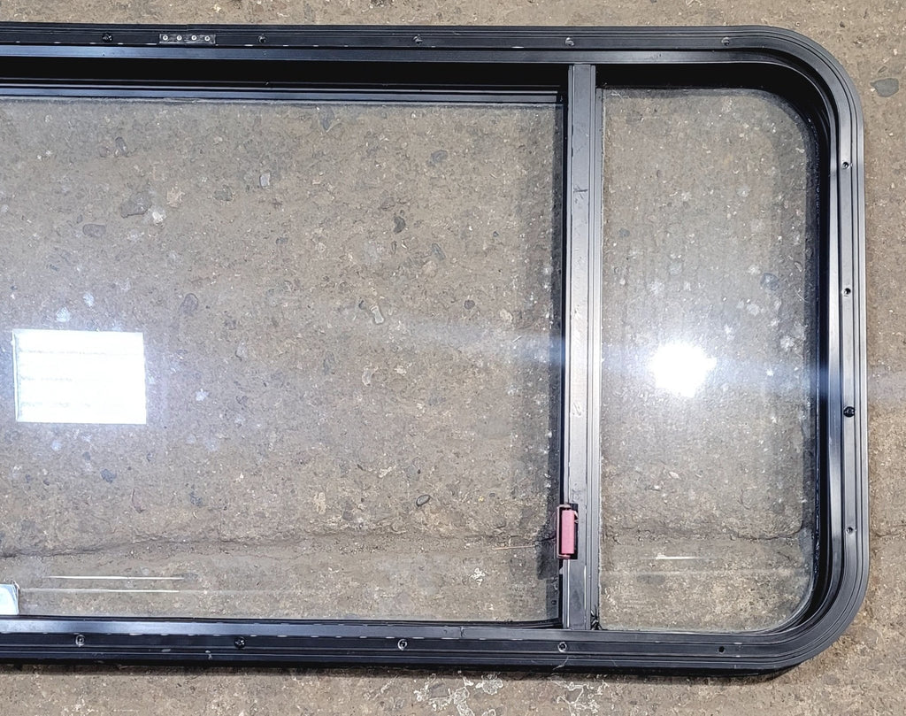 Used Black Radius Emergency Opening Window : 47 1/2" W x 21 1/2" H x 1 3/4" - Young Farts RV Parts