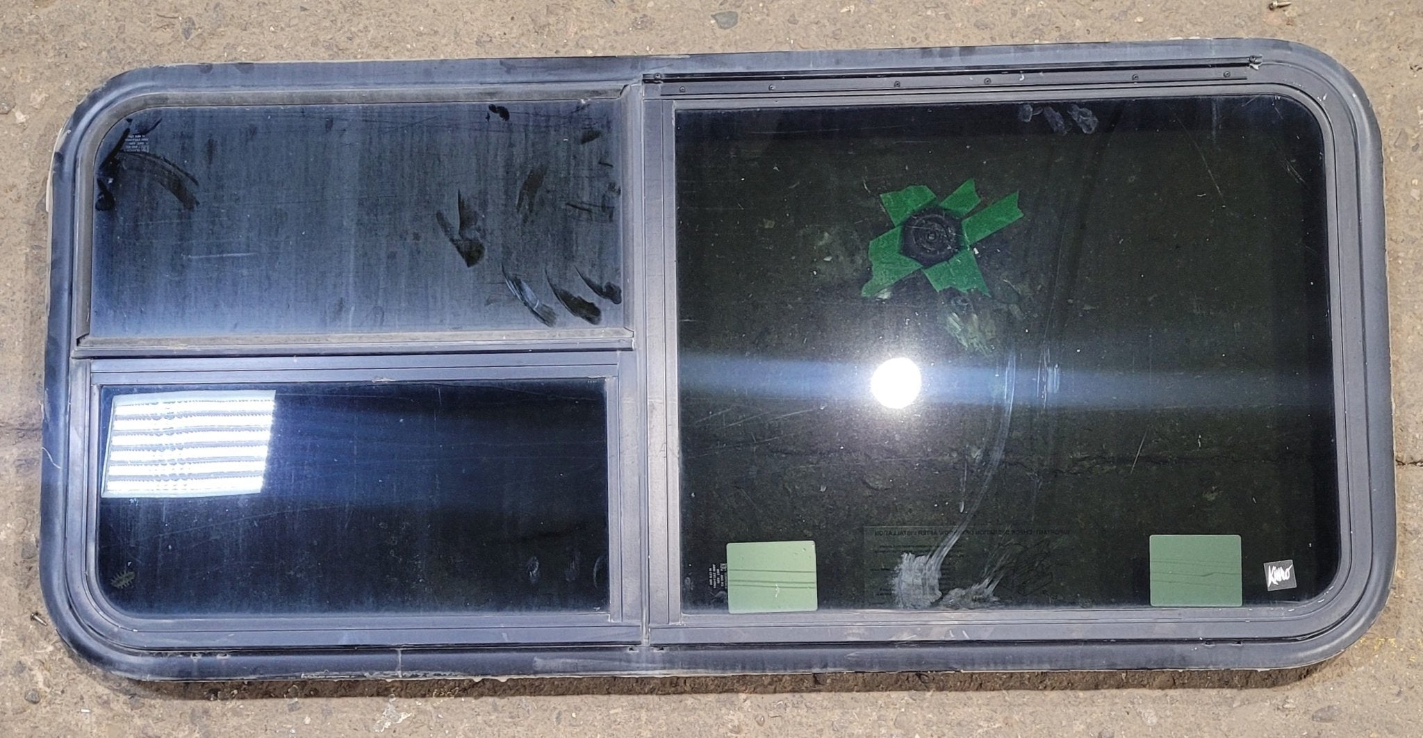 Used Black Radius Emergency Opening Window : 47 1/2" W x 21 1/2" H x 1 3/4" - Young Farts RV Parts