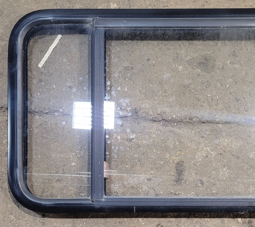 Used Black Radius Emergency Opening Window : 47 1/2" W x 21 1/2" H x 1 3/4" - Young Farts RV Parts