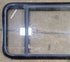 Used Black Radius Emergency Opening Window : 47 1/2" W x 21 1/2" H x 1 3/4" - Young Farts RV Parts