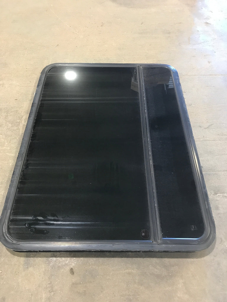 Used Black Radius Emergency Opening Window : 47 1/2" W x 34 1/2" H x 2" D - Young Farts RV Parts