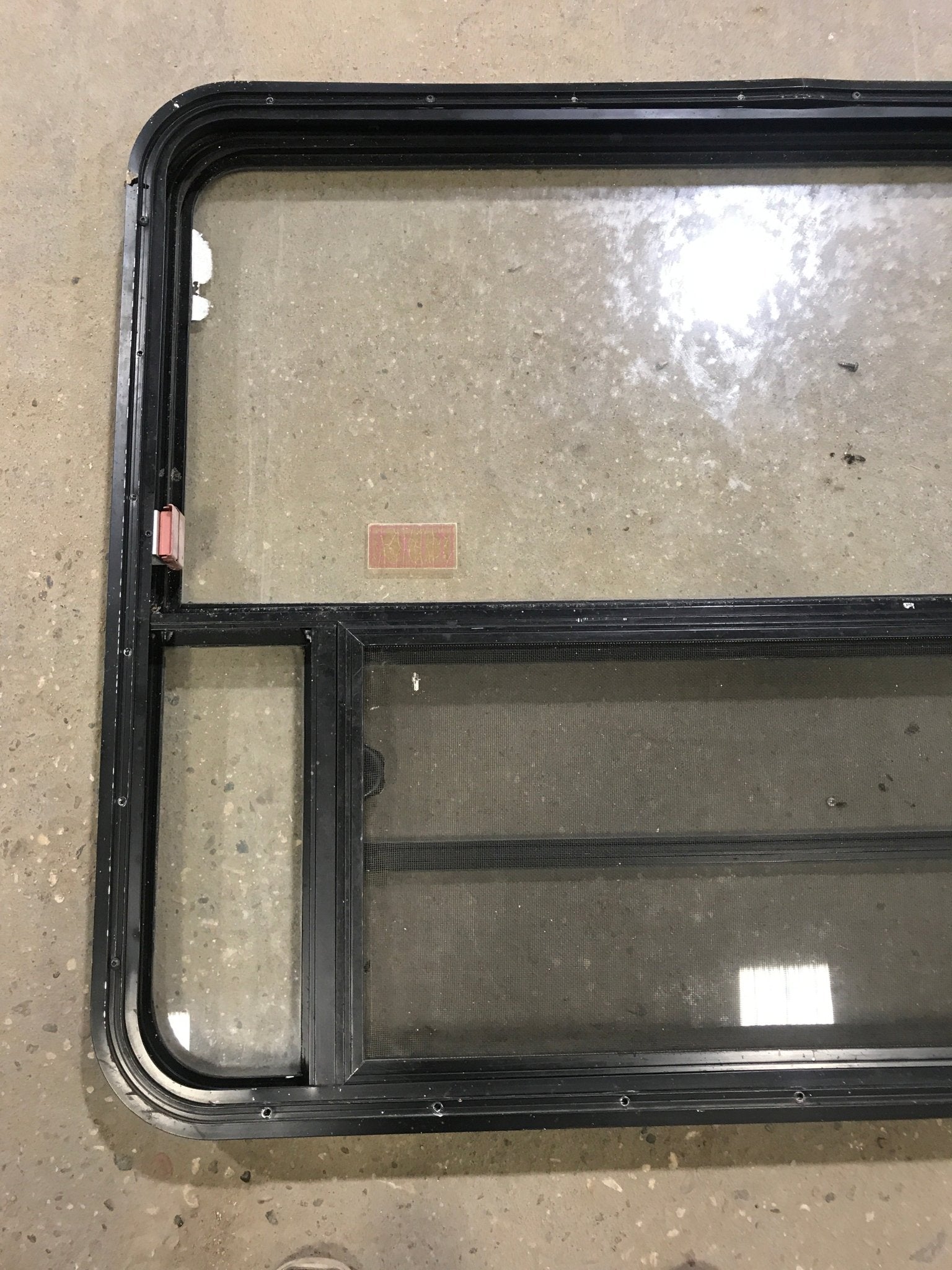 Used Black Radius Emergency Opening Window : 47 1/2" W x 34 1/2" H x 2" D - Young Farts RV Parts