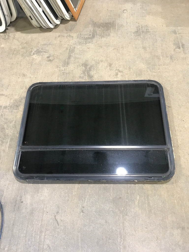 Used Black Radius Emergency Opening Window : 47 1/2" W x 34 1/2" H x 2" D - Young Farts RV Parts