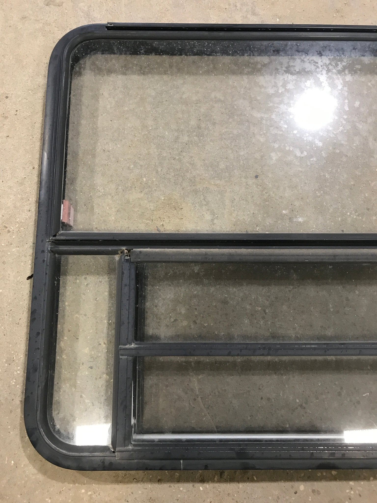 Used Black Radius Emergency Opening Window : 47 1/2" W x 34 1/2" H x 2" D - Young Farts RV Parts