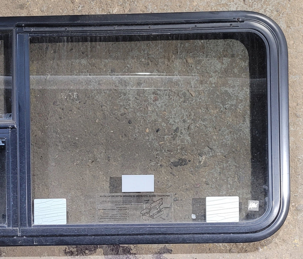 Used Black Radius Emergency Opening Window : 47 1/4" W x 21 1/4" H x 1 3/4" - Young Farts RV Parts