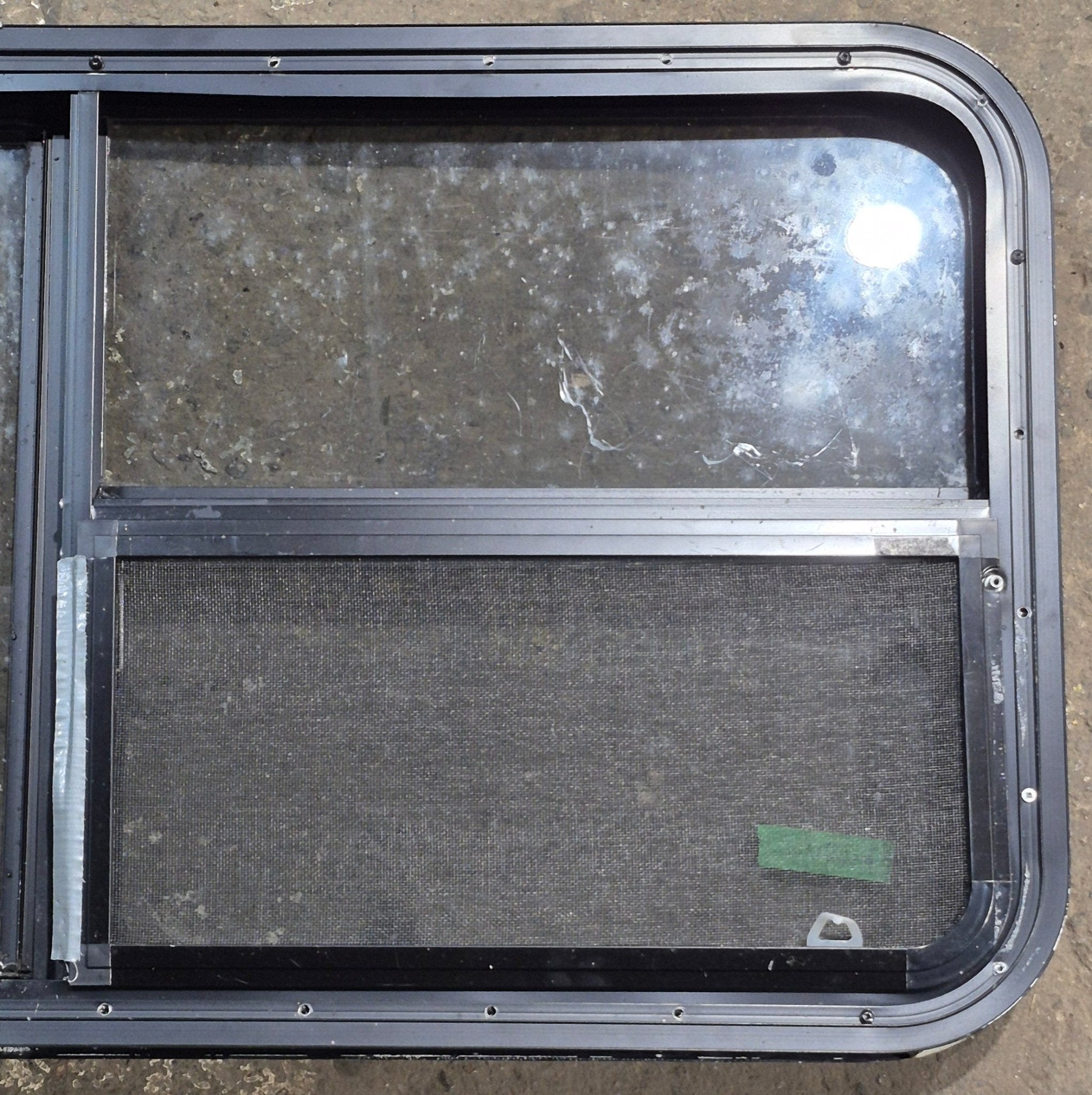 Used Black Radius Emergency Opening Window : 47 1/4" W x 21 1/4" H x 1 3/4" D - Young Farts RV Parts