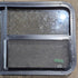 Used Black Radius Emergency Opening Window : 47 1/4" W x 21 1/4" H x 1 3/4" D - Young Farts RV Parts