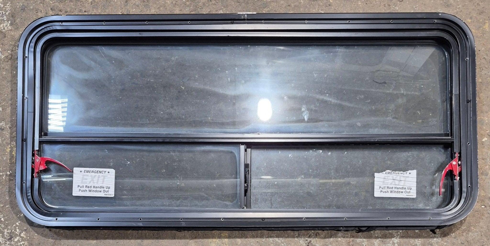 Used Black Radius Emergency Opening Window : 47 1/4" W x 21 1/4" H x 1 3/4" D - Young Farts RV Parts