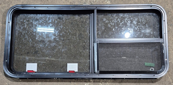 Used Black Radius Emergency Opening Window : 47 1/4" W x 21 1/4" H x 1 3/4" D - Young Farts RV Parts