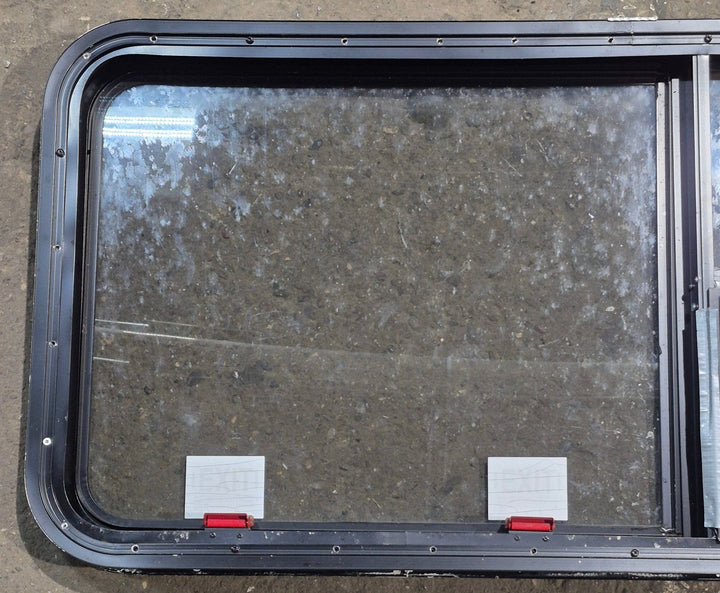 Used Black Radius Emergency Opening Window : 47 1/4" W x 21 1/4" H x 1 3/4" D - Young Farts RV Parts