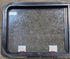 Used Black Radius Emergency Opening Window : 47 1/4" W x 21 1/4" H x 1 3/4" D - Young Farts RV Parts