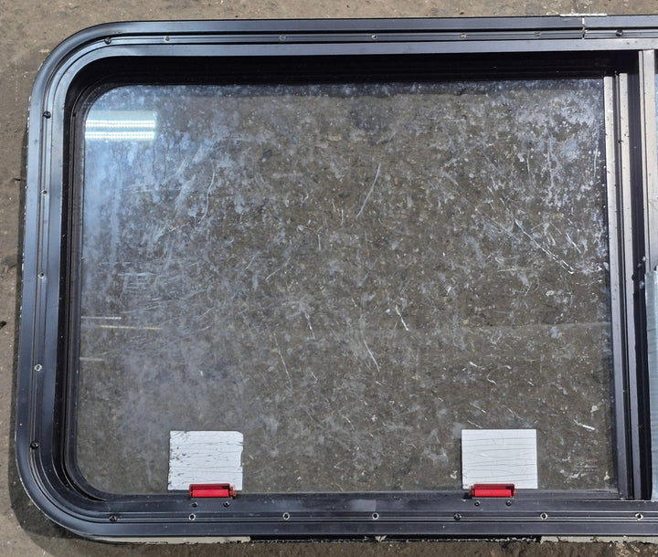 Used Black Radius Emergency Opening Window : 47 1/4" W x 21 1/4" H x 1 3/4" D - Young Farts RV Parts