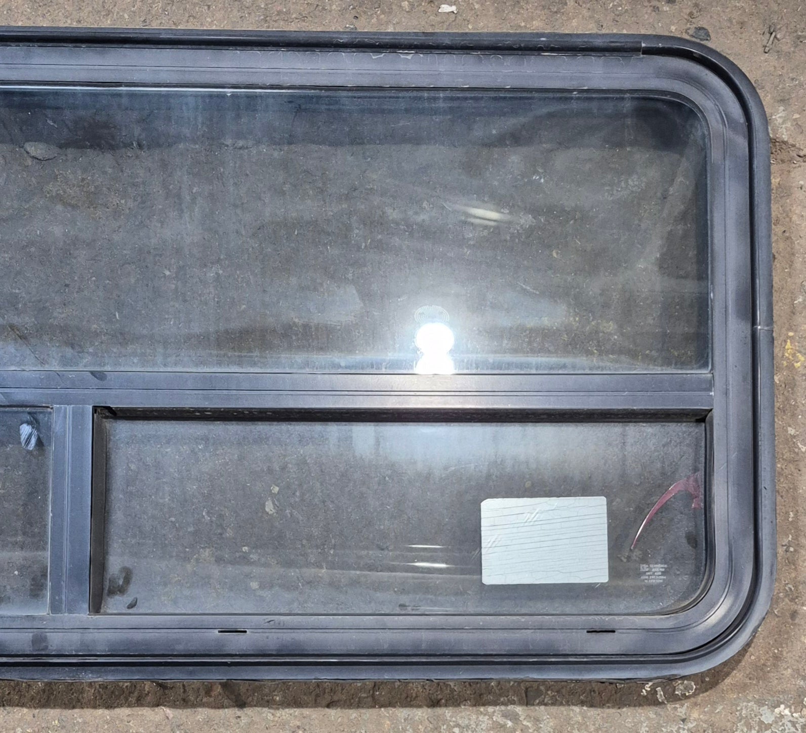Used Black Radius Emergency Opening Window : 47 1/4" W x 21 1/4" H x 1 3/4" D - Young Farts RV Parts