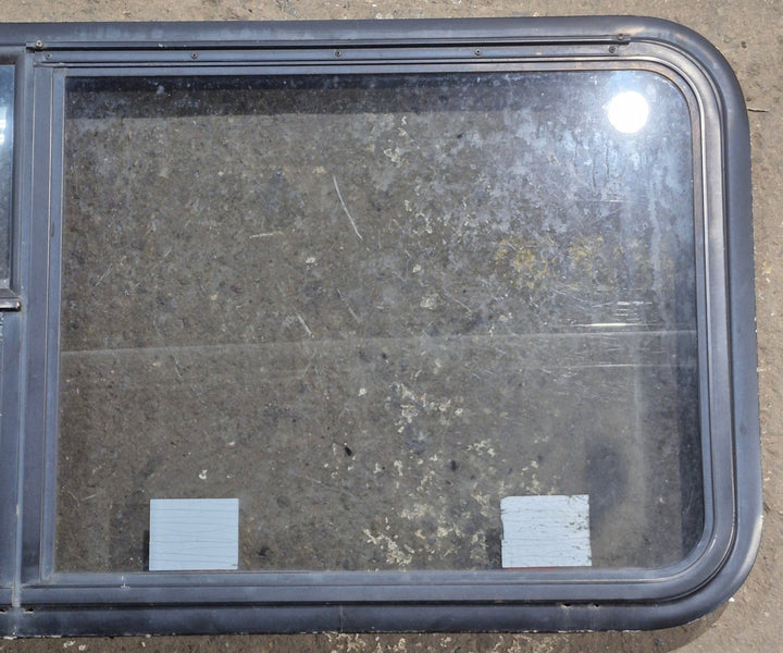 Used Black Radius Emergency Opening Window : 47 1/4" W x 21 1/4" H x 1 3/4" D - Young Farts RV Parts