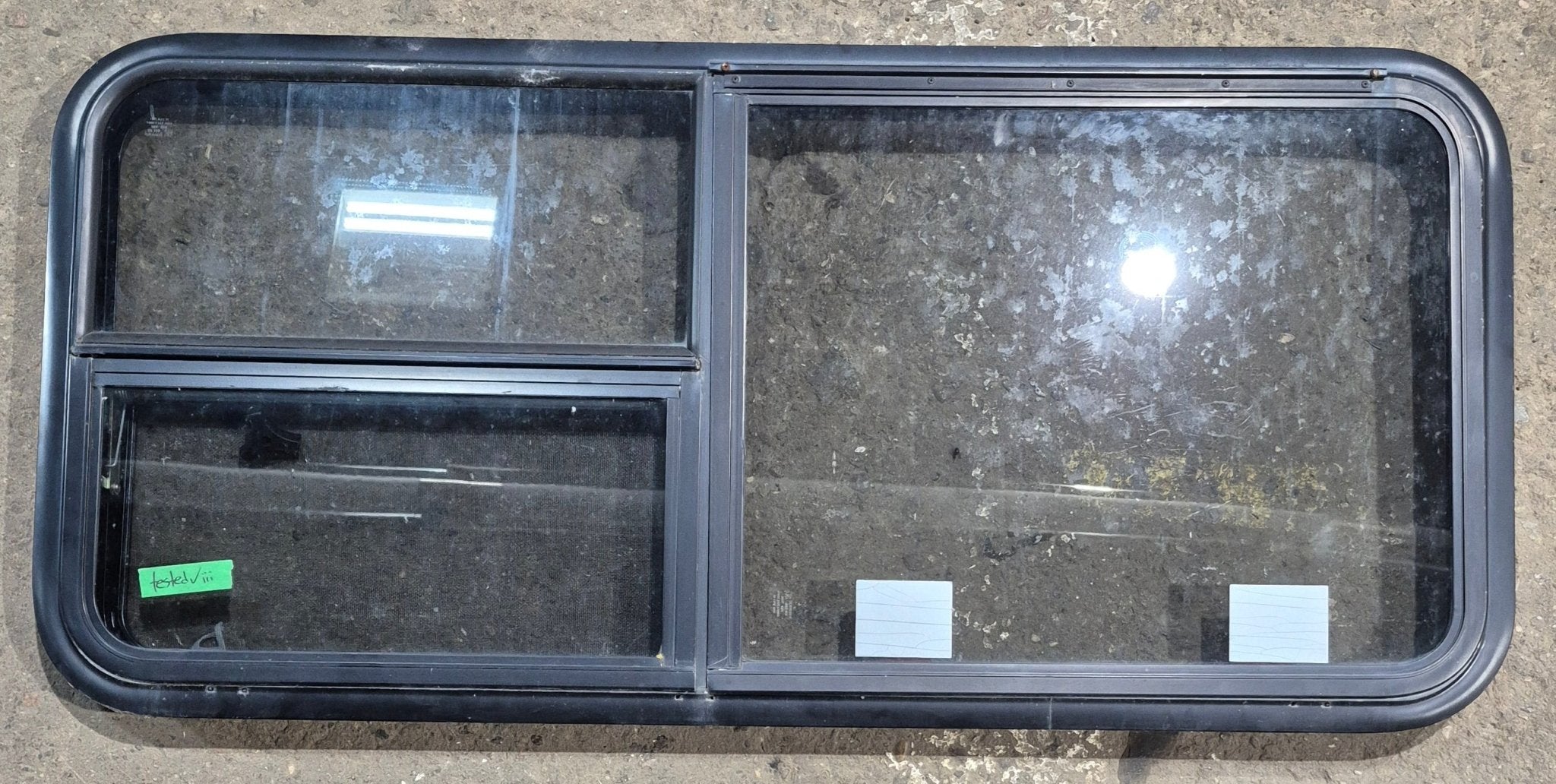 Used Black Radius Emergency Opening Window : 47 1/4" W x 21 1/4" H x 1 3/4" D - Young Farts RV Parts