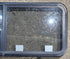 Used Black Radius Emergency Opening Window : 47 1/4" W x 21 1/4" H x 1 3/4" D - Young Farts RV Parts