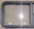 Used Black Radius Emergency Opening Window : 47 1/4" W x 21 1/4" H x 1 7/8" - Young Farts RV Parts