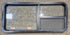 Used Black Radius Emergency Opening Window : 47 1/4" W x 21 1/4" H x 1 7/8" - Young Farts RV Parts