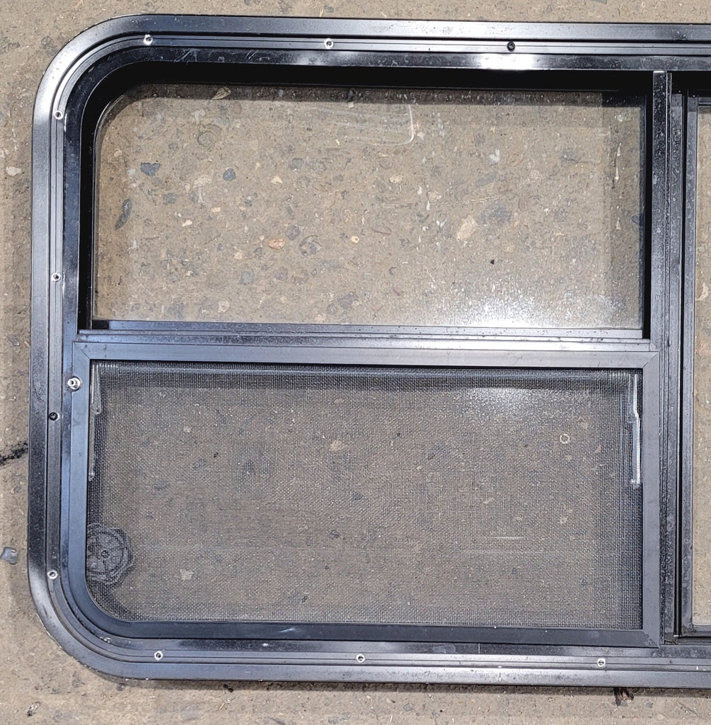 Used Black Radius Emergency Opening Window : 47 1/4" W x 21 1/4" H x 1 7/8" - Young Farts RV Parts