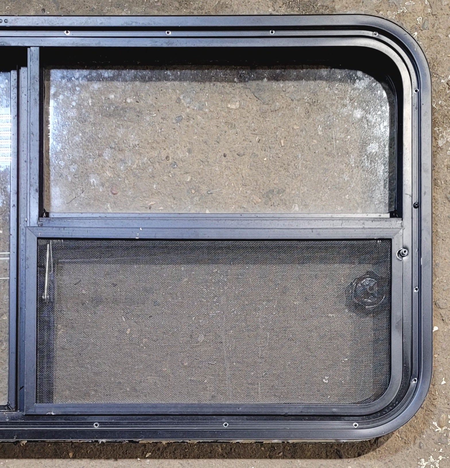 Used Black Radius Emergency Opening Window : 47 1/4" W x 21 1/4" H x 1 7/8" - Young Farts RV Parts