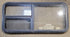 Used Black Radius Emergency Opening Window : 47 1/4" W x 21 1/4" H x 1 7/8" - Young Farts RV Parts