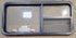 Used Black Radius Emergency Opening Window : 47 1/4" W x 21 1/4" H x 1 7/8" - Young Farts RV Parts