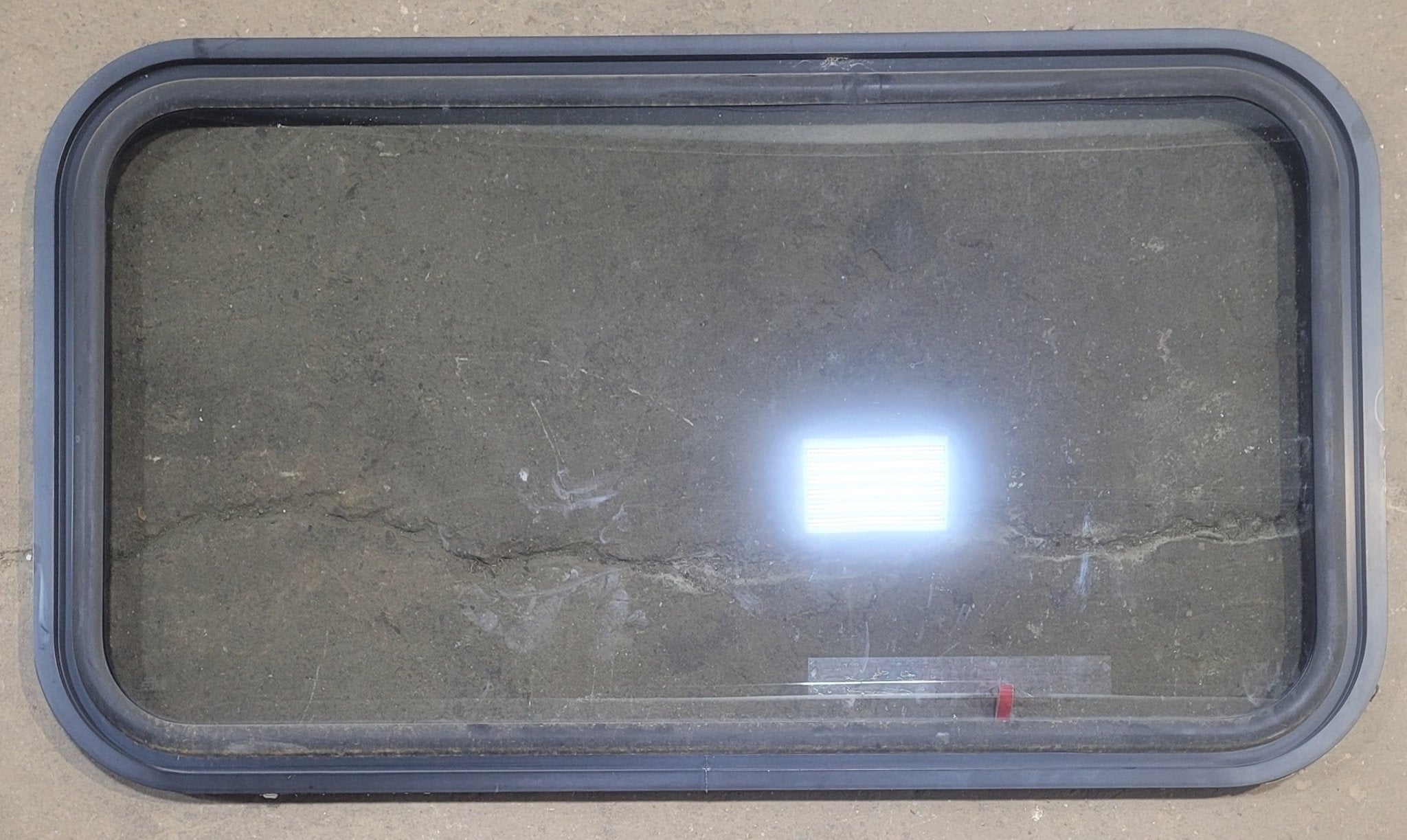 Used Black Radius Emergency Opening Window : 47 1/4" W x 25 1/2" H x 1" - Young Farts RV Parts