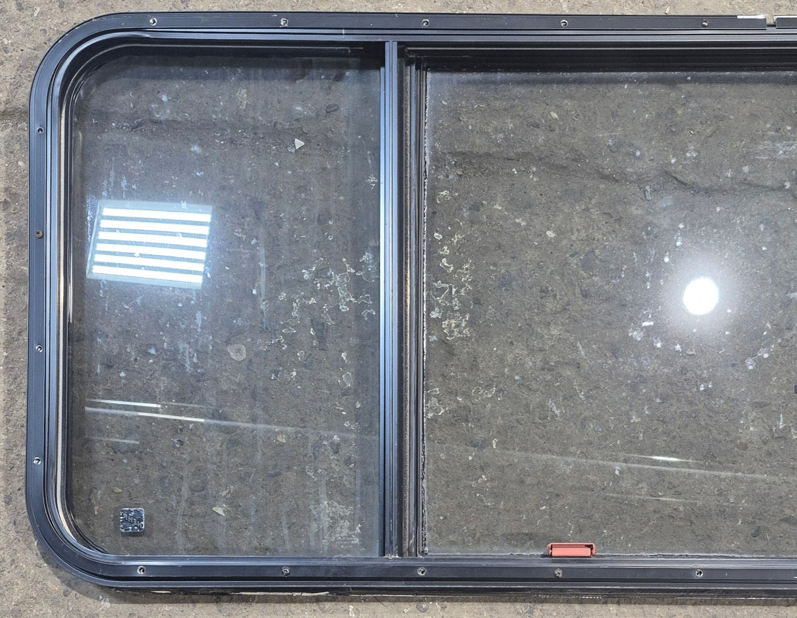 Used Black Radius Emergency Opening Window : 57 1/2